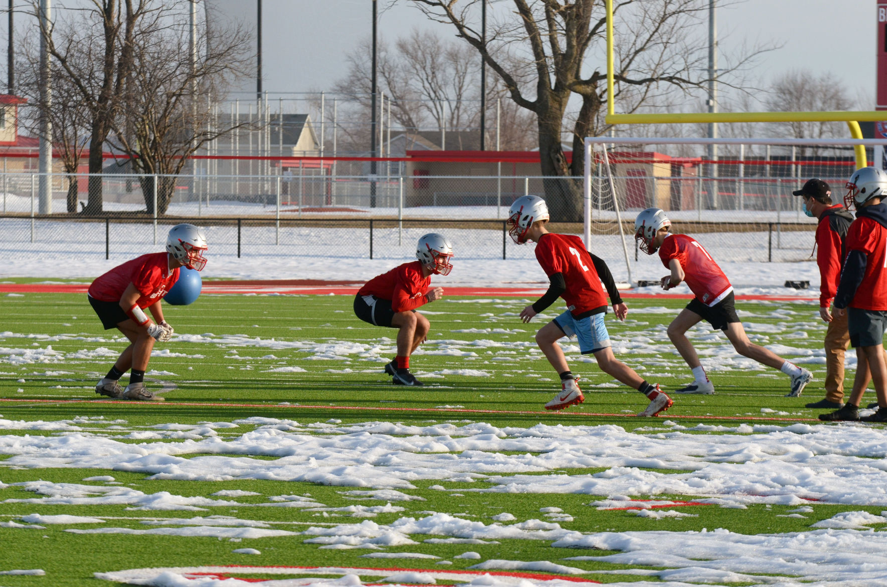 Football practice in snow